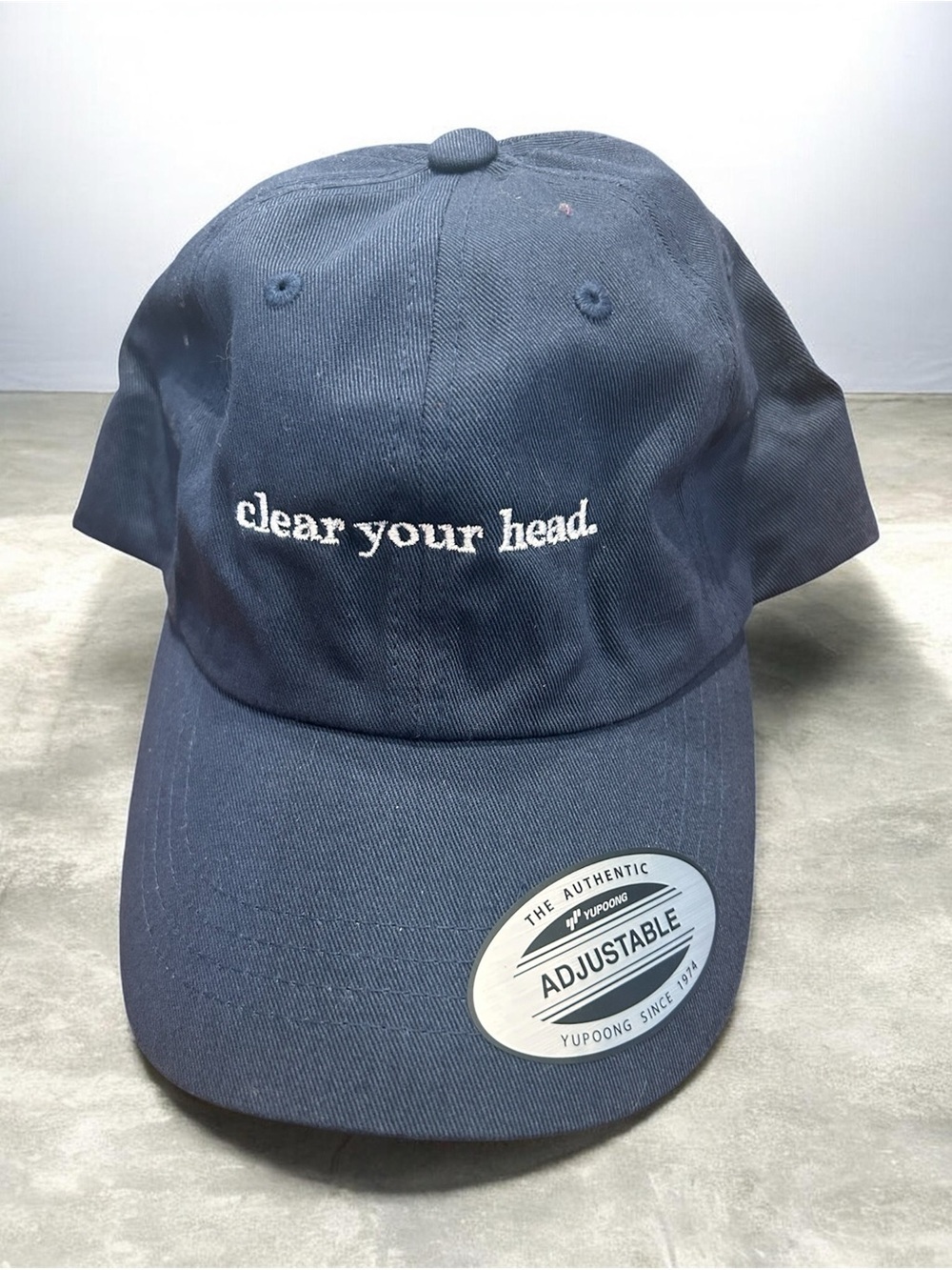 🌸Yupoong Men's Navy Adjustable Baseball Cap Solid One Size "clear your head”